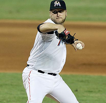 Marlins starter Mark Beuhrle scatters eight hits over 8 1/3 innings to earn his fifth win of the year.  (US Presswire)