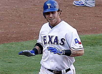 Josh Hamilton enjoys the spotlight after hitting a walk-off two-run homer with the Rangers trailing 7-5.  (AP)
