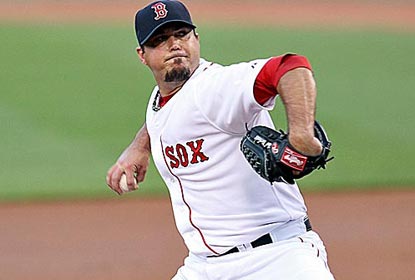 Boston starter Josh Beckett earns a no-decision after giving up just four hits over seven innings of work.  (Getty Images)