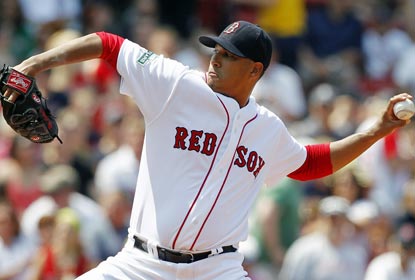 Boston starter Felix Doubront strikes out six in six innings of work to earn his fifth victory of the year.  (AP)