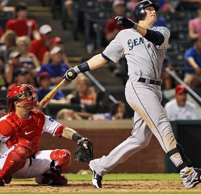 Justin Smoak smacks two three-run dingers against his former team as the M's score a MLB season-high 21 runs.  (US Presswire)