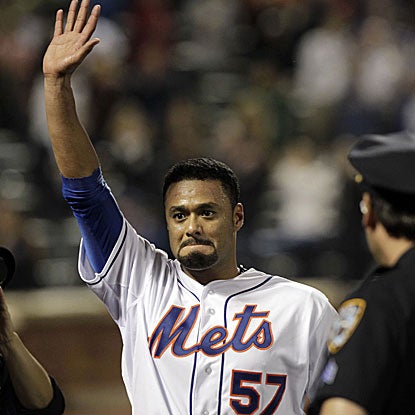 The Mets' Johan Santana strikes out eight and walks five in his no-hitter against the Cardinals.  (US Presswire)