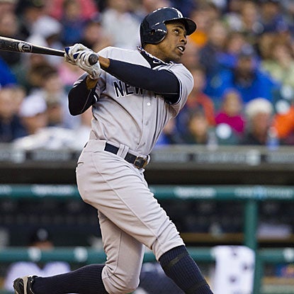 The Yankees score five runs on one hit in the second inning, Curtis Granderson's grand slam.  (US Presswire)