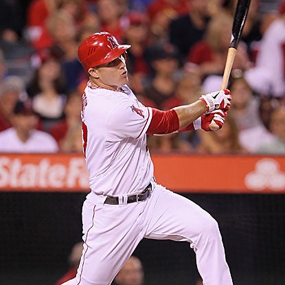 Mike Trout comes through with an RBI triple and then a tiebreaking two-run single to lead the Angels over the Rangers.  (Getty Images)