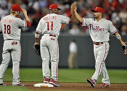Shane Victorino (right) has good reason to be happy after helping his team with a homer and five runs. (US Presswire)