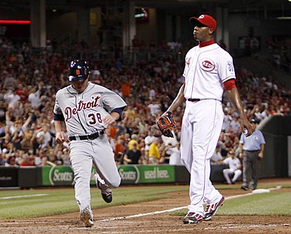 Aroldis Chapman can only look on as Matt Young scores the deciding run on his wild pitch in the eighth inning.  (US Presswire)