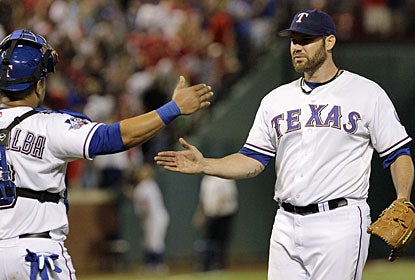 Colby Lewis strikes out seven and retires the first 16 batters to finish with a four-hitter for his fifth win. (AP)