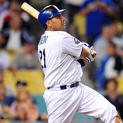 Juan Rivera connects for a three-run home run and knocks in four runs overall in the Dodgers' win.  (US Presswire)