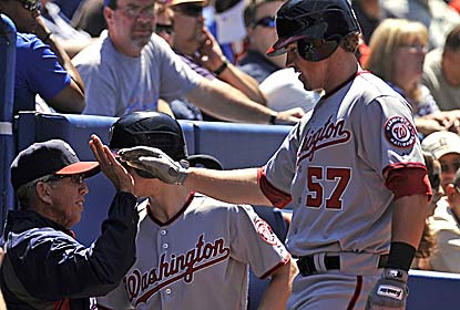 Tyler Moore, recalled from the minors last week, gets kudos after hitting the first two homers of his career in the win. (Getty Images)