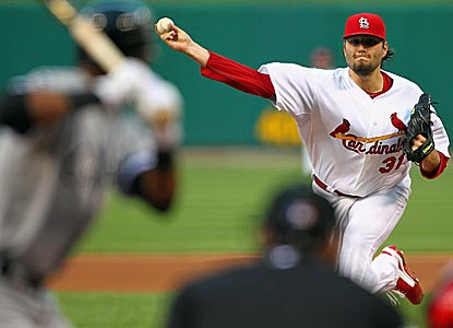 Lance Lynn gives up just three hits and joins the Mets' R.A. Dickey as the only 10-game winners in the majors. (Getty Images)