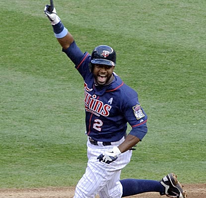 Denard Span reacts to his two-out, walk-off hit in the 15th inning to end the longest game in Target Field history.  (Getty Images)
