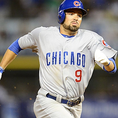 David DeJesus knocks in both the Cubs' runs with a single in the third inning and adds a triple in the 9th.  (US Presswire)