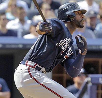 Jason Heyward watches his second home run, giving the Braves a 9-5 lead in the eighth inning vs. the Yankees.  (AP)
