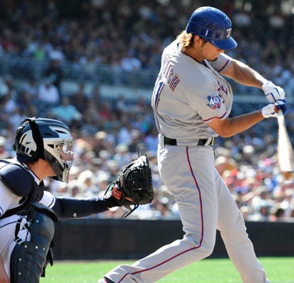 Yu Darvish gets his ninth win and first major-league hit while the Rangers add to their winning streak.  (Getty Images)