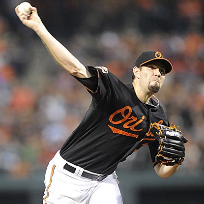 The Orioles' Jason Hammel does not allow an earned run against the Nationals, extending his streak to 19 straight innings.  (Getty Images)