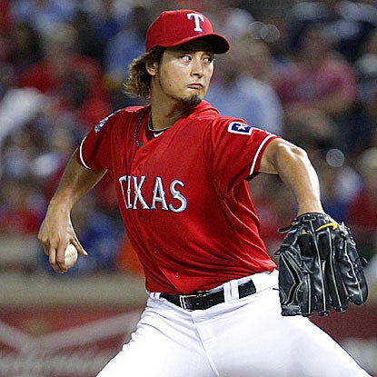 The Rangers' Yu Darvish records his fourth double-digit strikeout game en route to defeating the Tigers.  (AP)