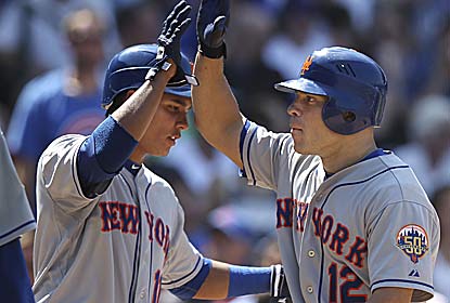 Scott Hairston (right) -- who hits a grand slam --  is one of four Mets players with at least four RBI in the rout. (Getty Images)