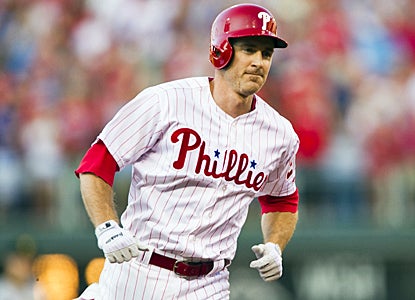 Chase Utley rounds the bases after hitting a homer in his first at-bat of the season, but the Pirates still beat the Phillies. (US Presswire)