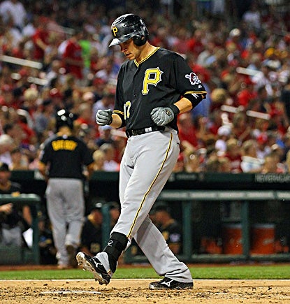Clint Barmes crosses home plate after hitting a solo home run against the Cardinals. (Getty Images)