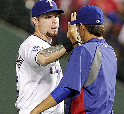 Josh Hamilton helps pitcher Martin Perez get his first win in his first career start. (AP)