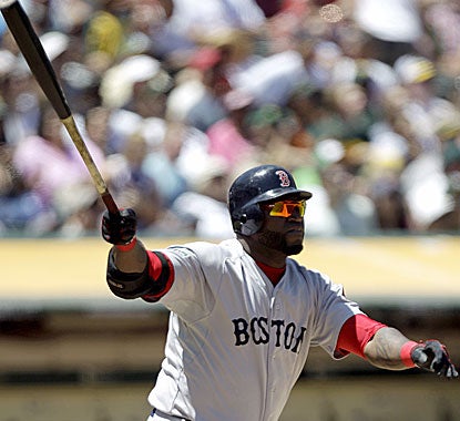 David Ortiz follows through on his 400th career home run and becomes the 49th player in MLB history to reach the milestone.  (AP)