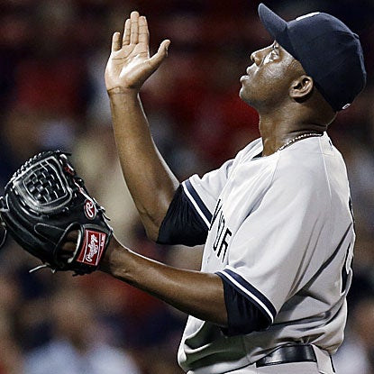 Rafael Soriano goes 1 1/3 innings to earn his 20th save of the season as the Yankees defeat the Red Sox.  (AP)