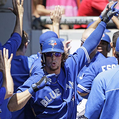 Colby Rasmus homers and drives in three runs to help the Blue Jays get past the White Sox and finish .500 at the break.  (AP)