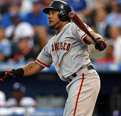 All-Star MVP Melky Cabrera collects a pair of hits, including this two-run home run in the fourth inning.  (Getty Images)
