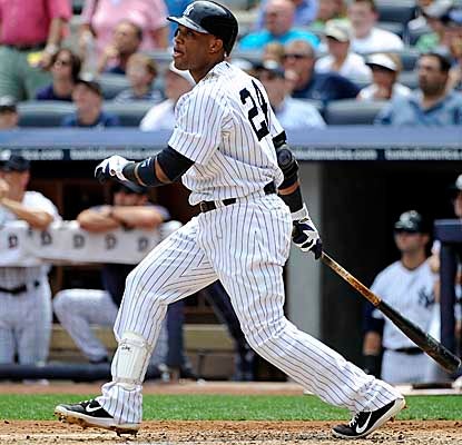 Robinson Cano wastes no time vs. Jerome Williams, hitting a home run off the Angels starter in the first inning. (AP)