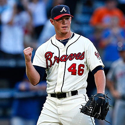 The Braves' Craig Kimbrel strikes out the side in the ninth inning to collect his major league-leading 27th save.  (Getty Images)