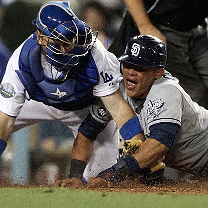 The Padres' Everth Cabrera catches Dodgers pitcher Kenley Jansen sleeping and steals home to tie the game in the ninth inning. (AP)