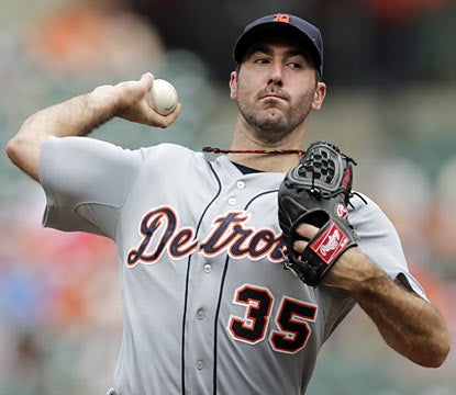 Justin Verlander strikes out eight batters and yields just three hits in eight innings en route to his 10th win of the season. (AP)