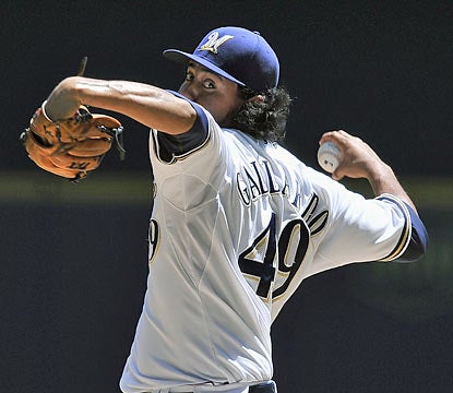 Yovani Gallardo dominates the Pirates as he strikes out a career-best 14 through seven innings.  (AP)
