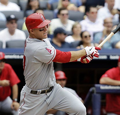 Mike Trout provides a pair of doubles and finishes as one of six Angels to have multiple hits in the win over the Yanks. (AP)