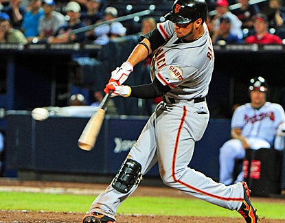 Gregor Blanco connects for a three-run shot in the 11th inning to help the Giants drop the Braves. (Getty Images)
