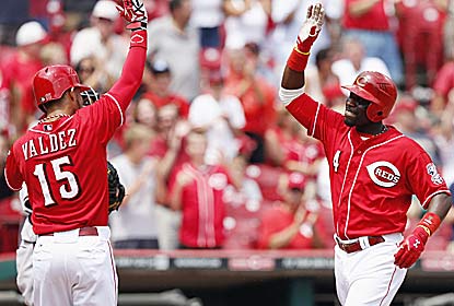 Brandon Phillips silences the booing crowd, driving in five runs to help the Reds overcome a 6-0 deficit. (Getty Images)