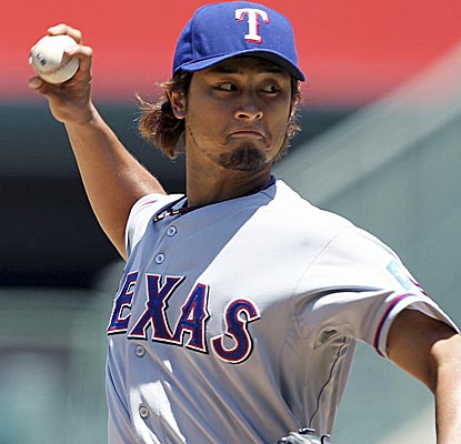 Rangers starter Yu Darvish goes seven innings for the win, striking out 11 for the fourth time this year.  (AP)