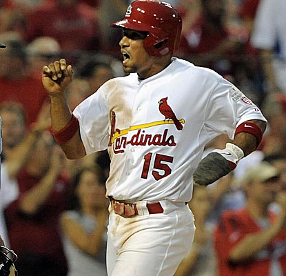Rafael Furcal scores on a triple by Skip Schumaker, one of 12 Cardinal runs in the seventh inning.  (US Presswire)