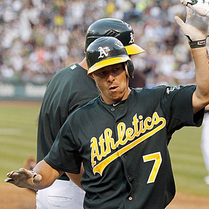 Brandon Inge's solo HR in the eighth inning breaks a 1-1 tie and sends the A's past the Yankees for the third straight game.  (US Presswire)