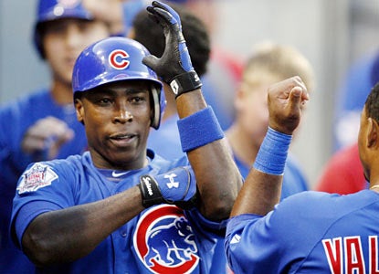 Alfonso Soriano celebrates in the dugout following a HR in the fifth inning, his 19th on the season. (US Presswire)
