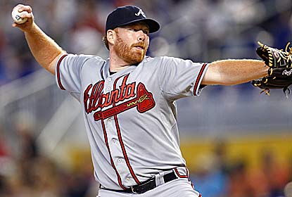 Tommy Hanson manages to beat the Marlins despite giving up seven walks and seven steals over five innings. (Getty Images)
