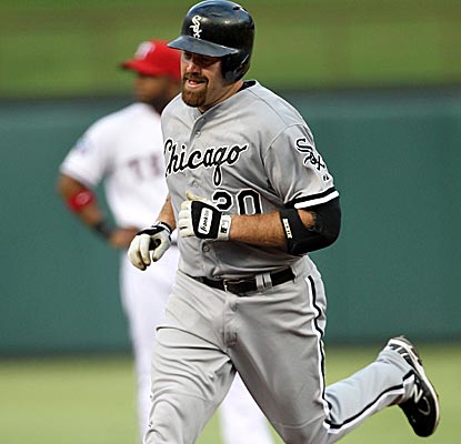 Kevin Youkilis circles the bases after hitting a home run, contributing to the White Sox's 35 runs over the last four games.  (Getty Images)