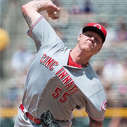 Mat Latos strikes out eight in eight strong innings of work in the Reds' 10th straight win, two shy of their franchise record.  (Getty Images)