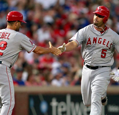 Albert Pujols goes deep twice to reach 20 home runs for the season. He now has 43 career multihomer games.  (US Presswire)