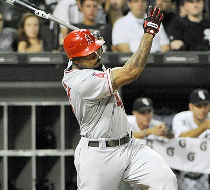 Howard Kendrick drives in the go-ahead run in the 10th inning to help the Angels end their three-game losing streak. (Getty Images)
