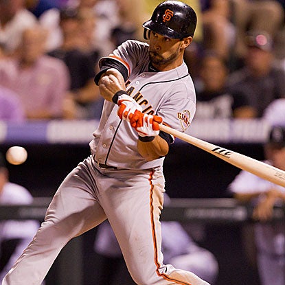 Angel Pagan contributes four hits to the Giants' total of 17 in the game, a season high.  (Getty Images)