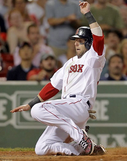 Dustin Pedroia is one of three Boston players to finish with three hits in the victory against Texas. (AP)