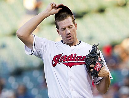 After a 1-2-3 first inning, rookie Zach McAllister gives up nine runs on six hits in the second.  (Getty Images)