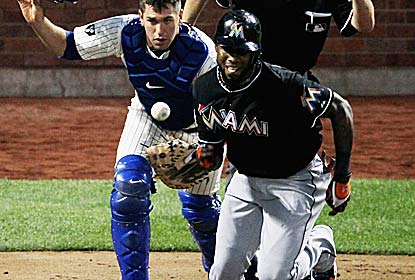 Jose Reyes -- booed in his Citi Field return -- legs out a trickler to extend his hitting streak to a career-high 25 games. (Getty Images)