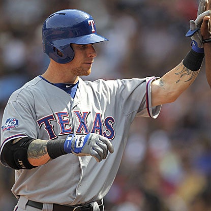 Josh Hamilton homers and knocks in four runs in the  Rangers' victory against the Red Sox. (Getty Images)